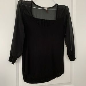 Black blouse with sheer sleeves